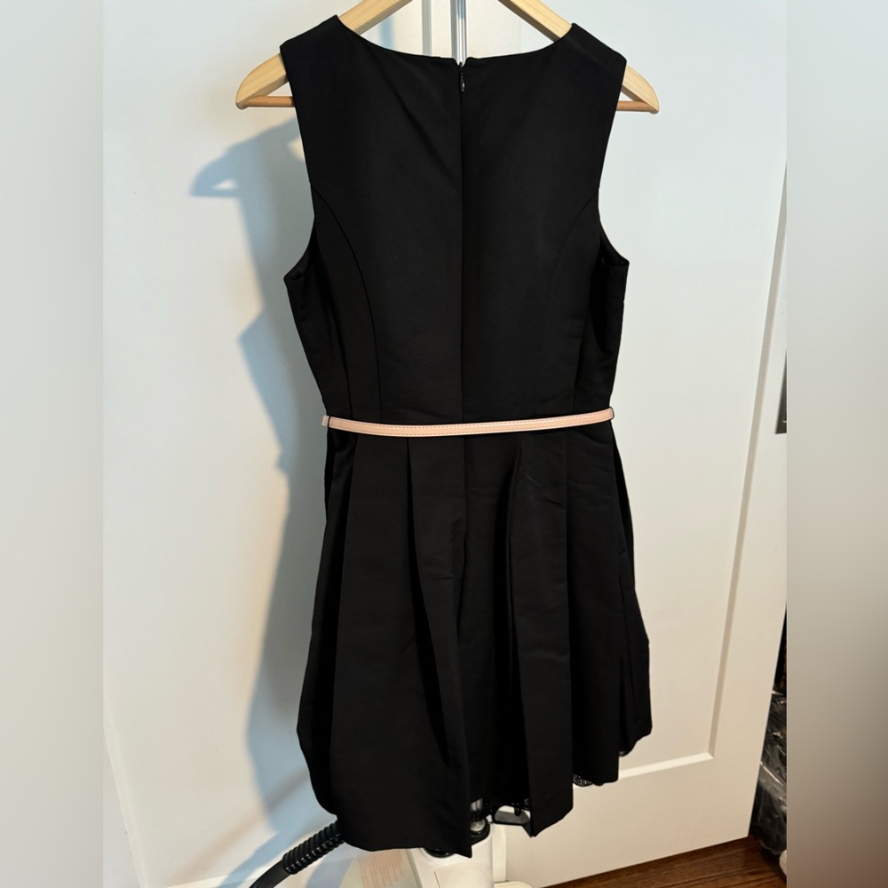 Audrey Hepburn style little black dress with sequin detail at base